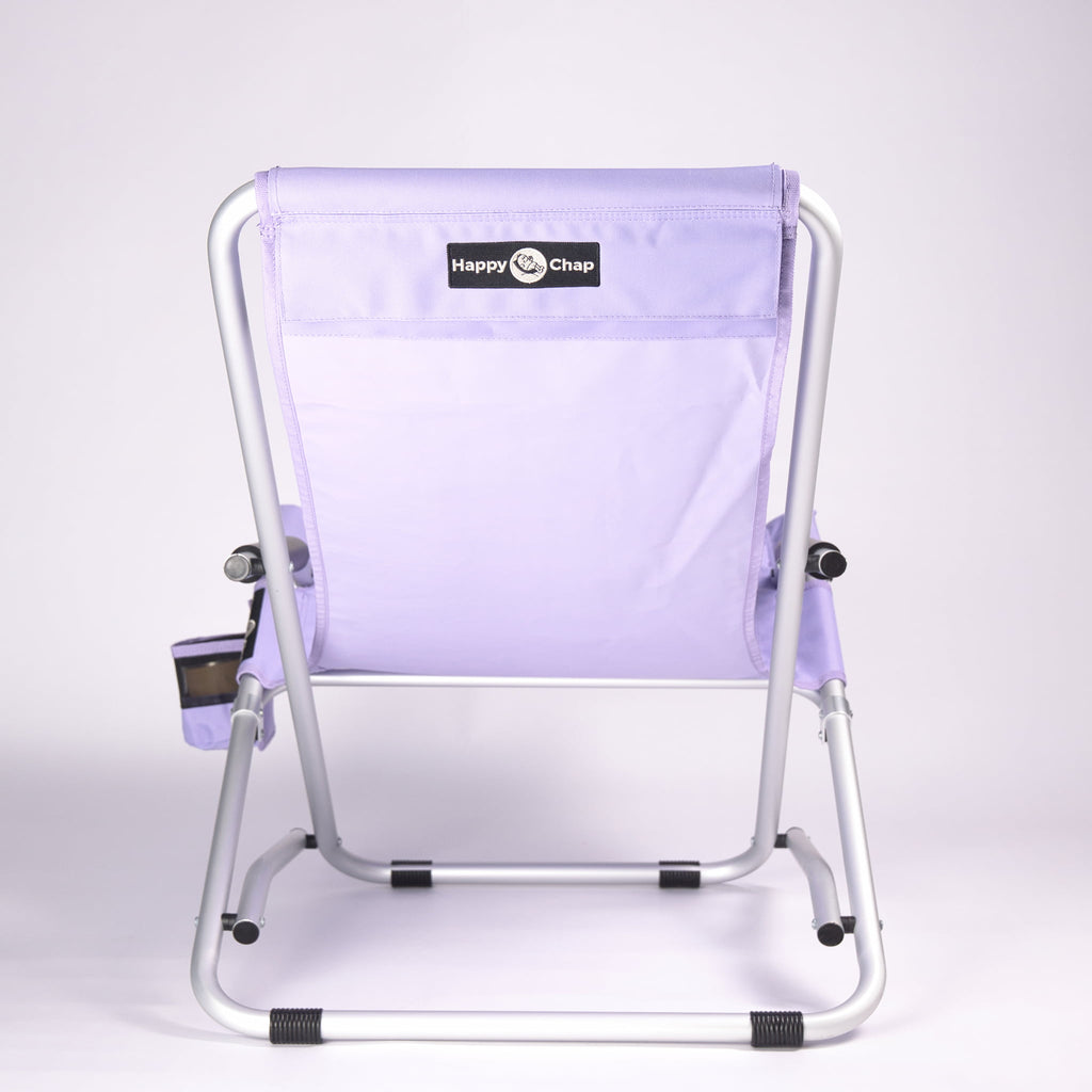 Purple folding chair with pocket and 'Happy Chap' branding on a white background