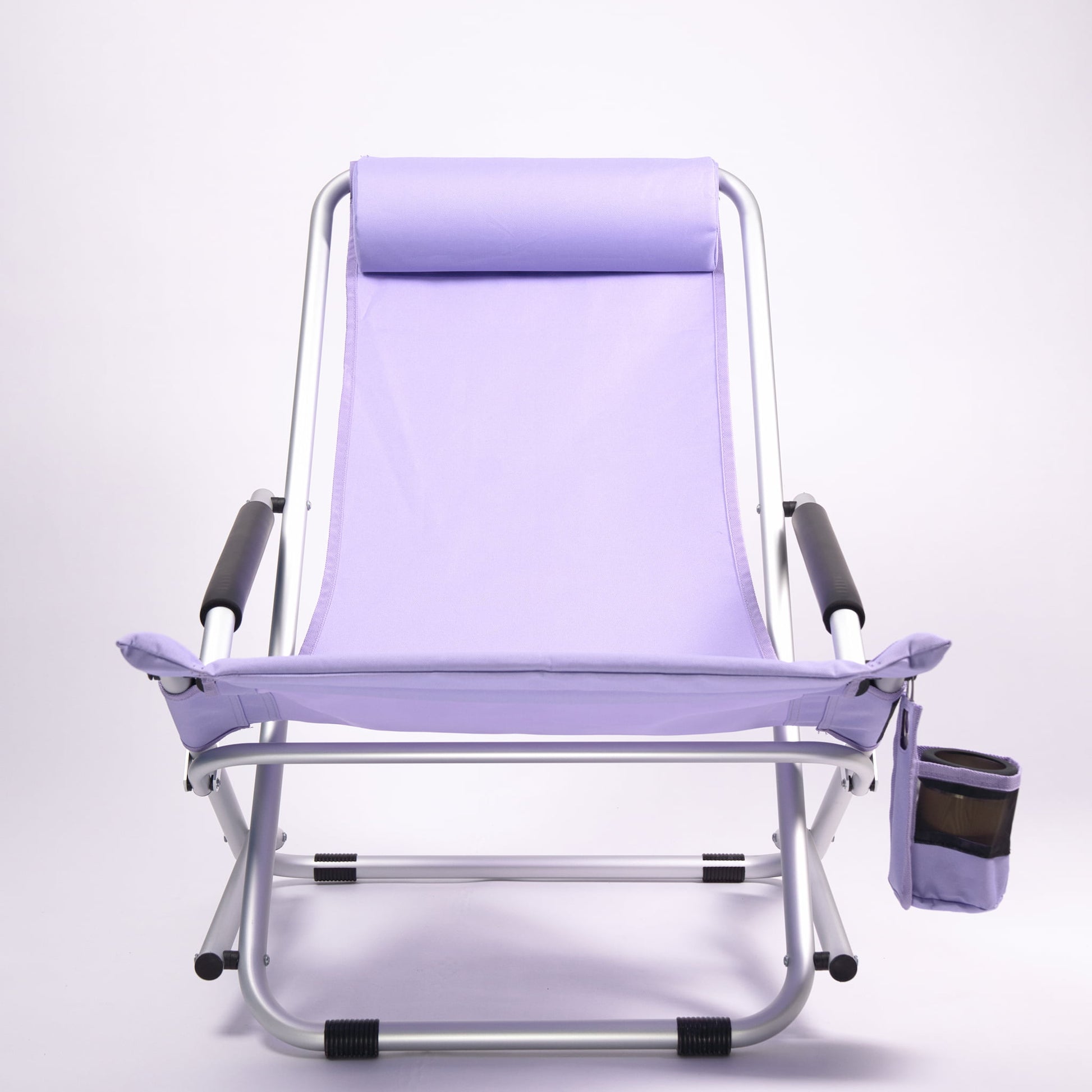 Purple folding chair with black armrests and drink holder on a white background