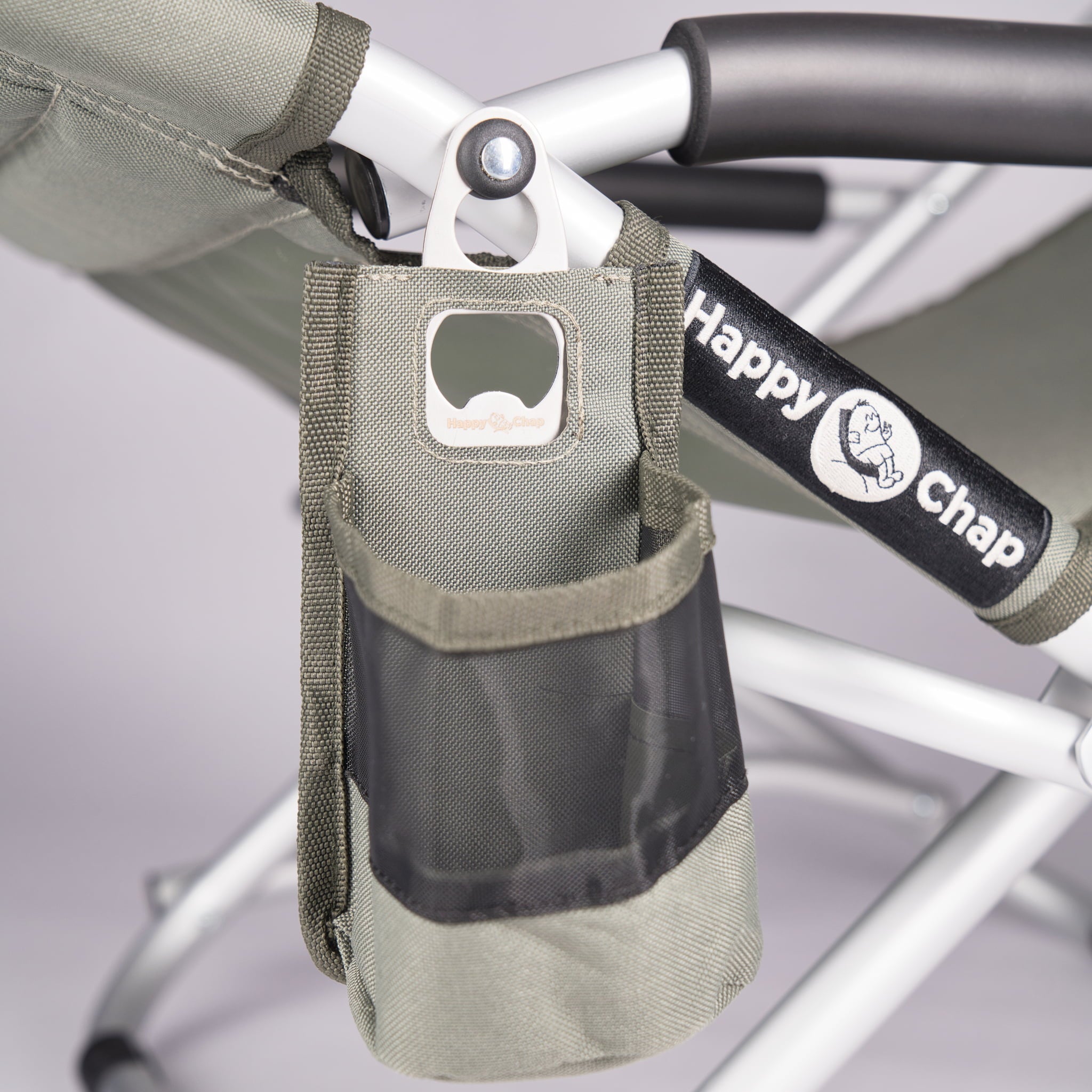 detachable Olive coloured cup holder attached to  happy chap chair