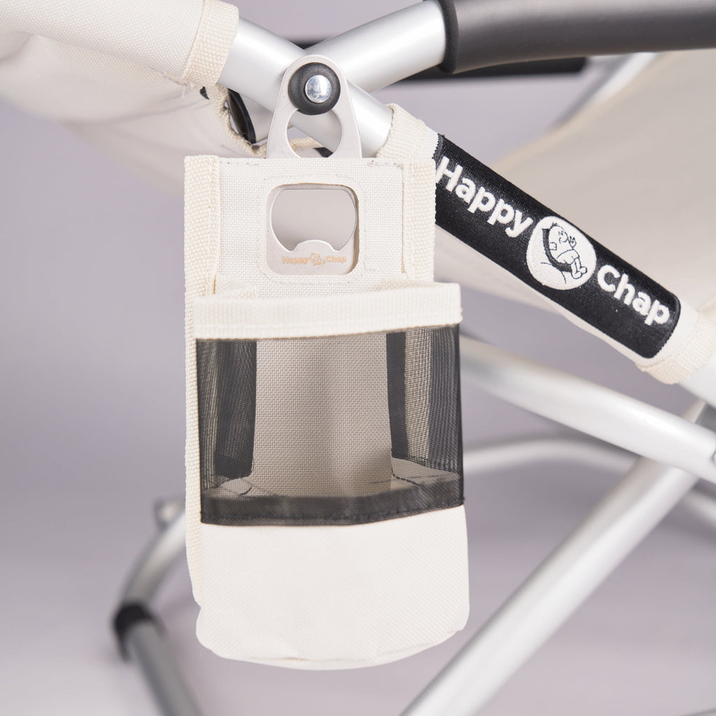 A Detachable drink holder with a mesh pouch and bottle opener on beige Happy Chap chair