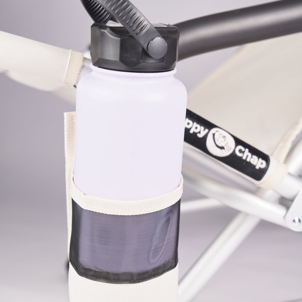 large white 1 litre pargo water bottle in a beige detachable drink holder attached a 'Happy Chap' chair in Sand colour