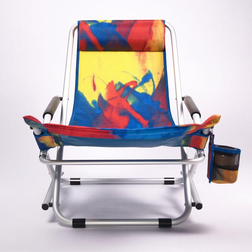 Colorful folding chair with a abstract art design on a white background